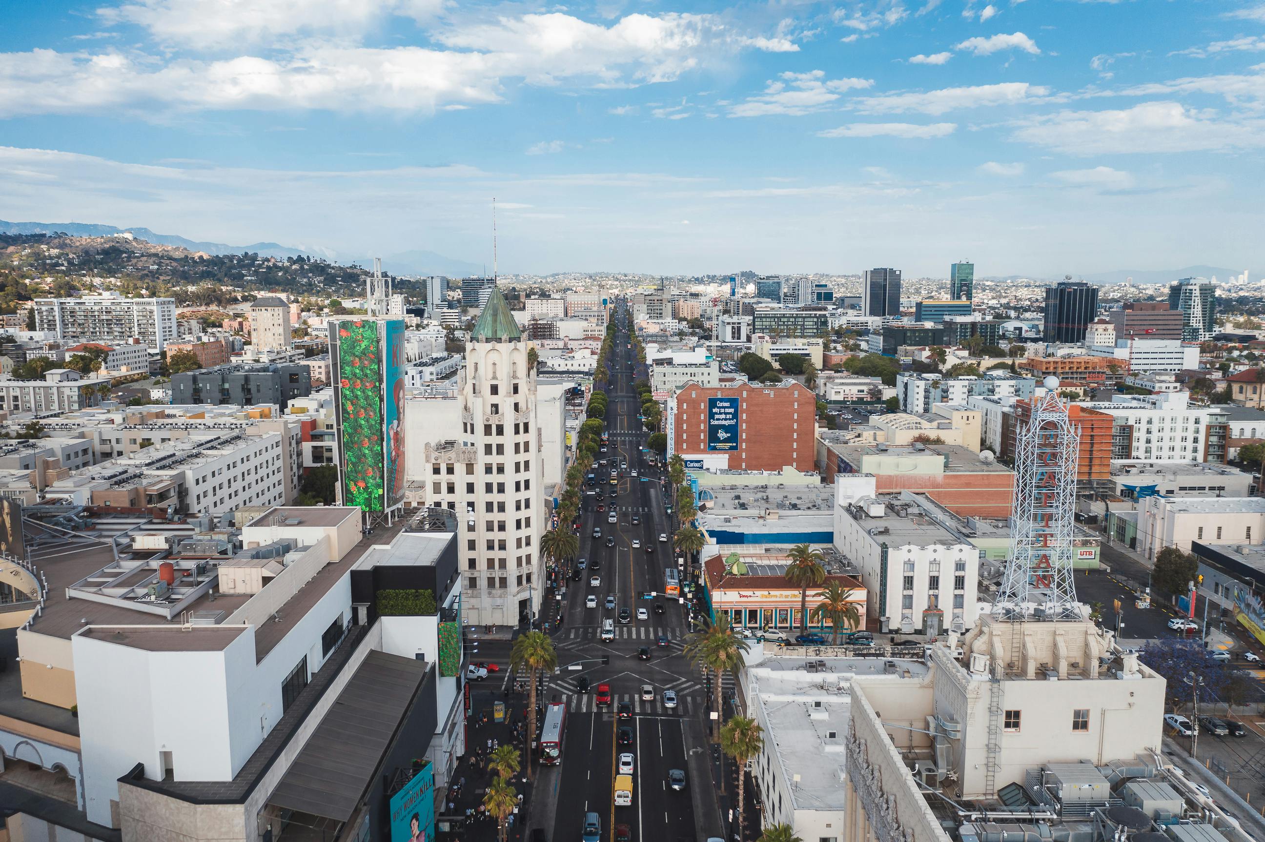 A captivating aerial shot of Hollywood Boulevard showcasing Los Angeles skyline and iconic architecture.